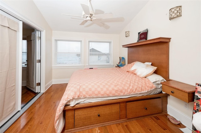 258 Longstreet Ave, Bronx, NY 10465 - bedroom featuring wood finished floors, a ceiling fan, vaulted ceiling, and baseboards