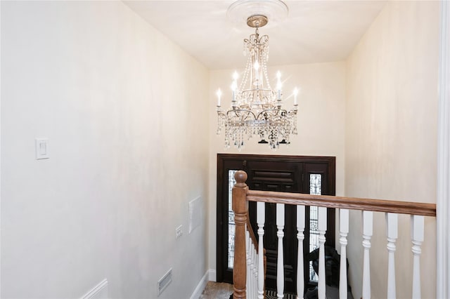 258 Longstreet Ave, Bronx, NY 10465 - staircase featuring a chandelier and baseboards
