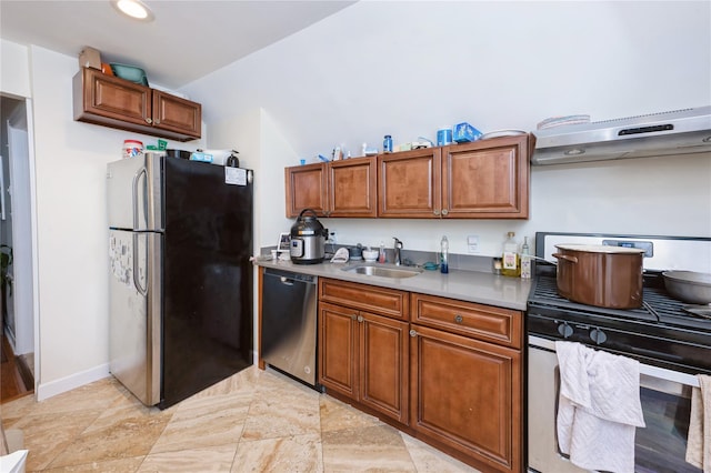 258 Longstreet Ave, Bronx, NY 10465 - kitchen featuring brown cabinetry, stainless steel appliances, light countertops, a sink, and baseboards