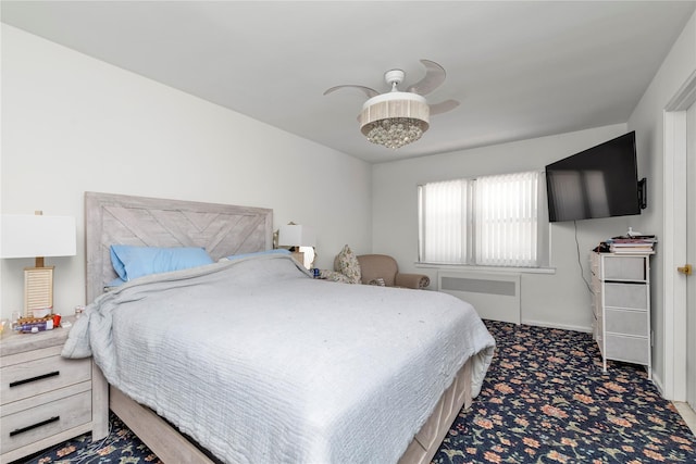 1203 E Broadway Unit G11, Hewlett, NY 11557 - bedroom with carpet floors, a ceiling fan, baseboards, and radiator heating unit