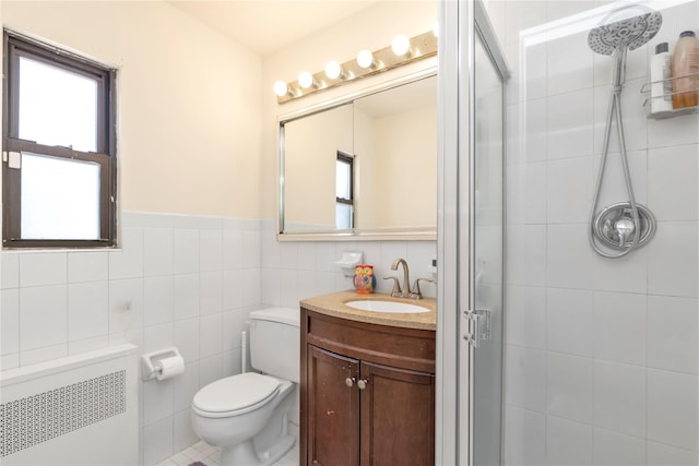 1203 E Broadway Unit G11, Hewlett, NY 11557 - bathroom featuring radiator heating unit, plenty of natural light, and a shower stall