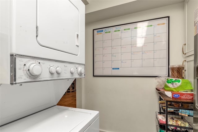 1203 E Broadway Unit G11, Hewlett, NY 11557 - clothes washing area featuring stacked washer and dryer