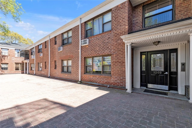 1203 E Broadway Unit G11, Hewlett, NY 11557 - exterior space featuring a wall mounted AC