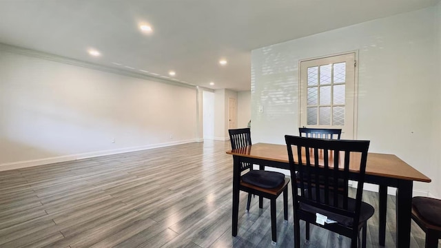 40 Stoner Ave Unit 1S, Great Neck, NY 11021 - dining room featuring baseboards, recessed lighting, and wood finished floors