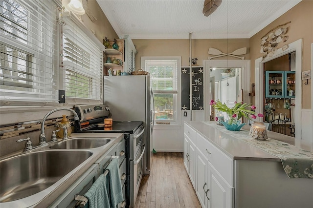 46 Satinwood Rd, Rocky Point, NY 11778 - kitchen with range with two ovens, white cabinetry, light wood-style flooring, light countertops, and open shelves