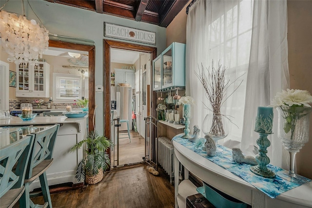 46 Satinwood Rd, Rocky Point, NY 11778 - doorway with dark wood-style flooring