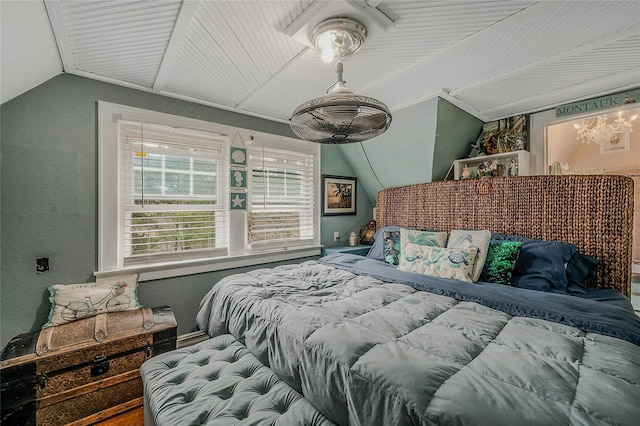 46 Satinwood Rd, Rocky Point, NY 11778 - bedroom with vaulted ceiling and a chandelier