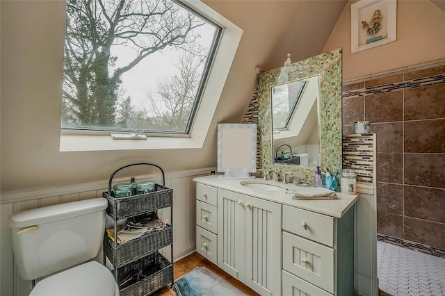 46 Satinwood Rd, Rocky Point, NY 11778 - bathroom featuring vanity, wainscoting, and a tile shower