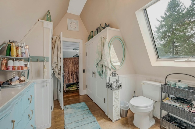 46 Satinwood Rd, Rocky Point, NY 11778 - bathroom featuring wainscoting, wood finished floors, and lofted ceiling
