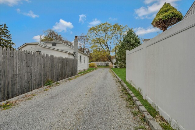 46 Satinwood Rd, Rocky Point, NY 11778 - view of dirt / gravel road