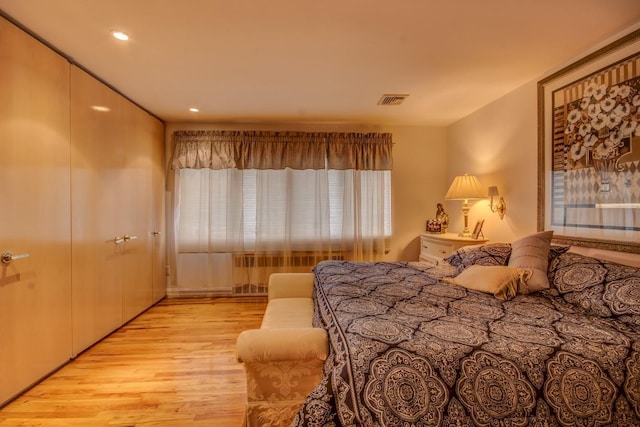 21629 28th Ave, Bayside, NY 11360 - bedroom featuring recessed lighting, light wood finished floors, and visible vents
