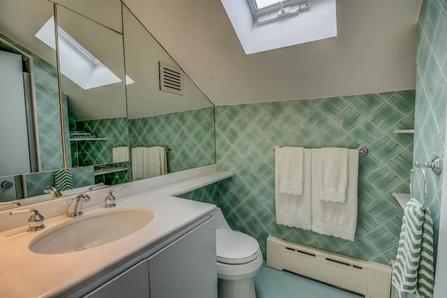 21629 28th Ave, Bayside, NY 11360 - bathroom featuring vanity, toilet, tile walls, a baseboard radiator, and a skylight