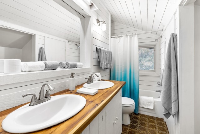 bathroom with wood ceiling, toilet, vaulted ceiling, and a sink