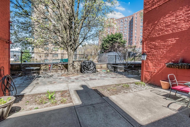 view of patio with fence