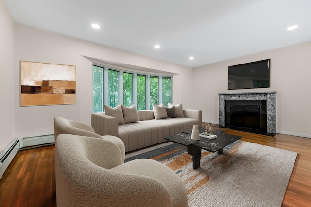 96 Mulberry Ave, Garden City, NY 11530 - living area featuring wood finished floors, a high end fireplace, and recessed lighting
