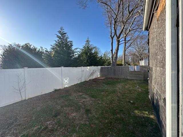 view of yard featuring a fenced backyard