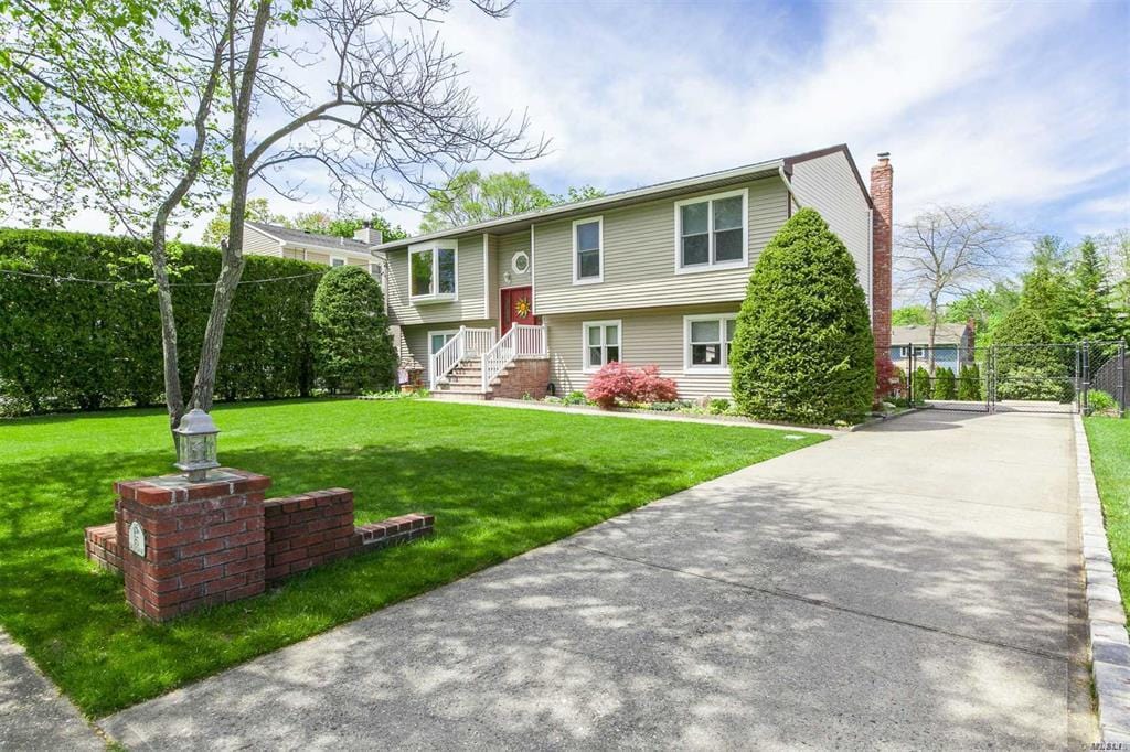 25 Dale Ln, Smithtown, NY 11787 - raised ranch featuring a chimney