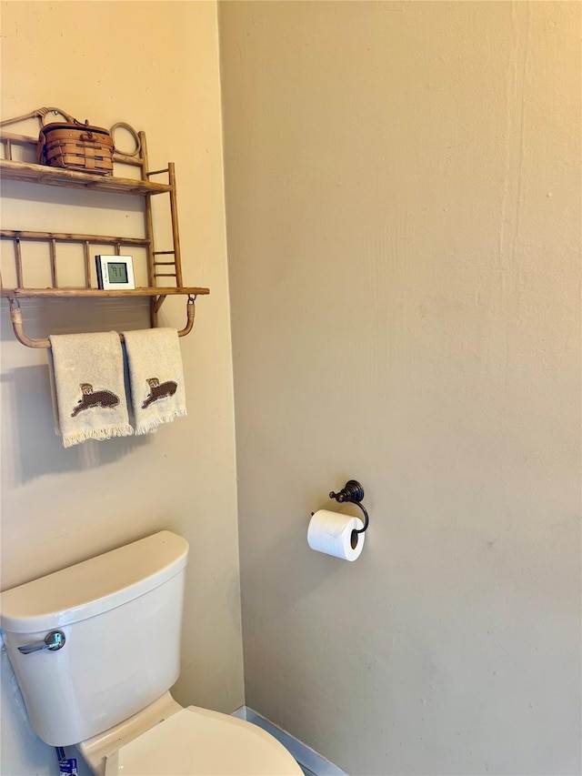 bathroom featuring toilet