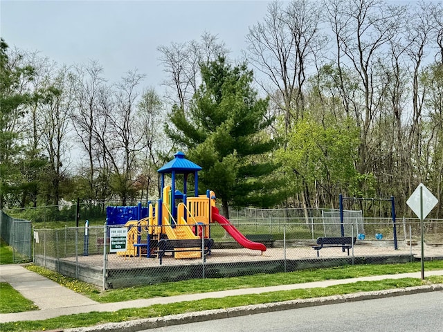 community play area featuring fence