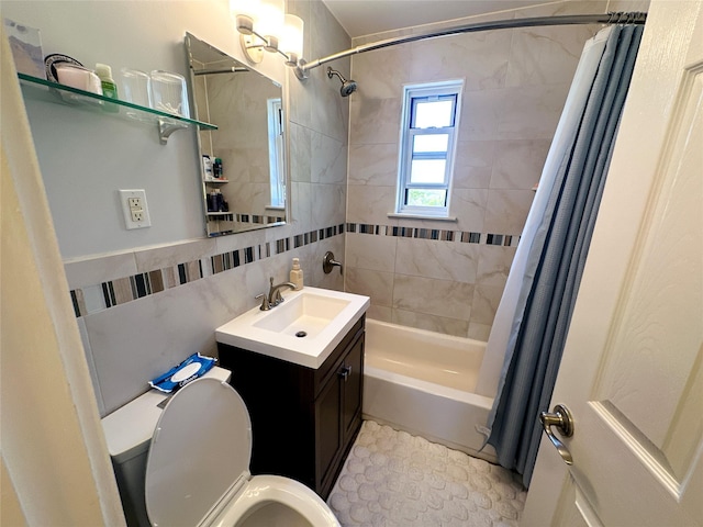 11 Westview Ave Unit 16-2, White Plains, NY 10603 - bathroom featuring tile walls, vanity, toilet, and shower / bath combination with curtain