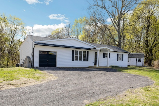 21 Kent Rd, Hopewell Junction, NY 12533 - single story home featuring dirt driveway, a shed, a shingled roof, an attached garage, and central AC unit
