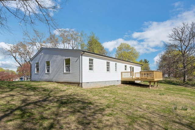 21 Kent Rd, Hopewell Junction, NY 12533 - back of house featuring a wooden deck and a yard