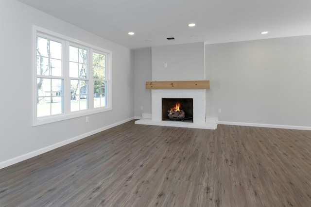 21 Kent Rd, Hopewell Junction, NY 12533 - unfurnished living room with baseboards, recessed lighting, wood finished floors, and a fireplace