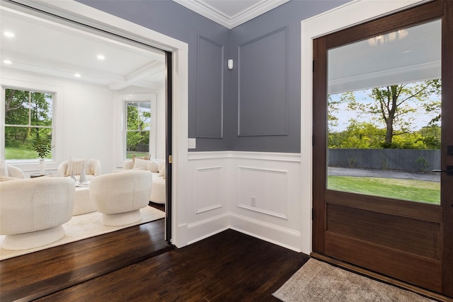 53 Jay St, Katonah, NY 10536 - foyer entrance with dark wood-style flooring, a decorative wall, plenty of natural light, crown molding, and recessed lighting