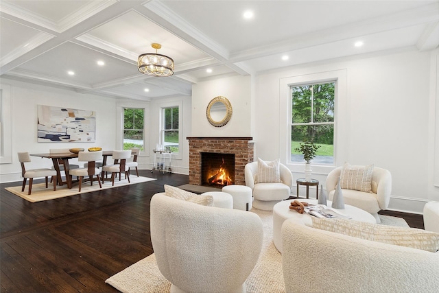 53 Jay St, Katonah, NY 10536 - living area featuring dark wood-type flooring, healthy amount of natural light, beamed ceiling, a brick fireplace, and recessed lighting