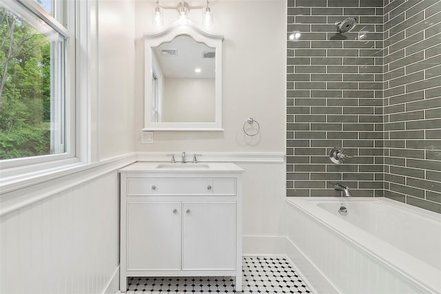 53 Jay St, Katonah, NY 10536 - full bathroom featuring shower / washtub combination, vanity, wainscoting, and a decorative wall