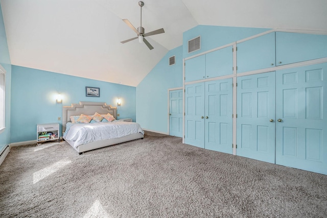 carpeted bedroom with lofted ceiling, visible vents, multiple closets, and a ceiling fan