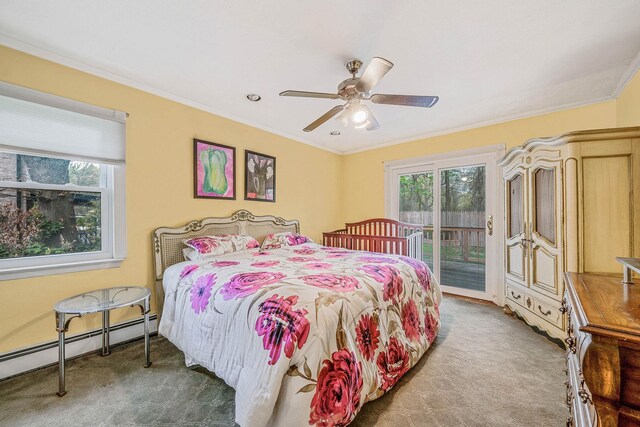 carpeted bedroom with baseboard heating, ornamental molding, access to outside, and multiple windows