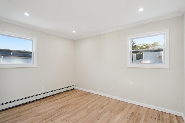 unfurnished room with crown molding, baseboard heating, wood finished floors, baseboards, and recessed lighting