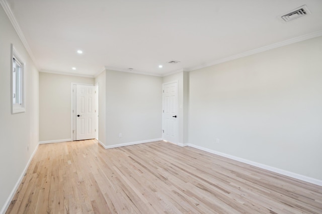 spare room with recessed lighting, visible vents, ornamental molding, and light wood-style floors