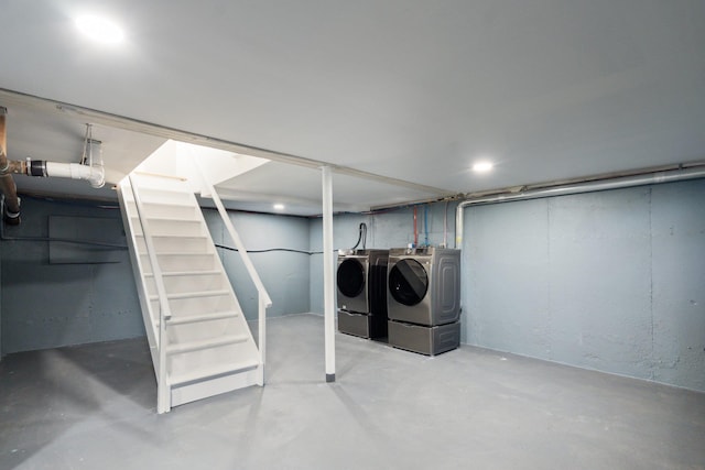 finished below grade area with washing machine and dryer