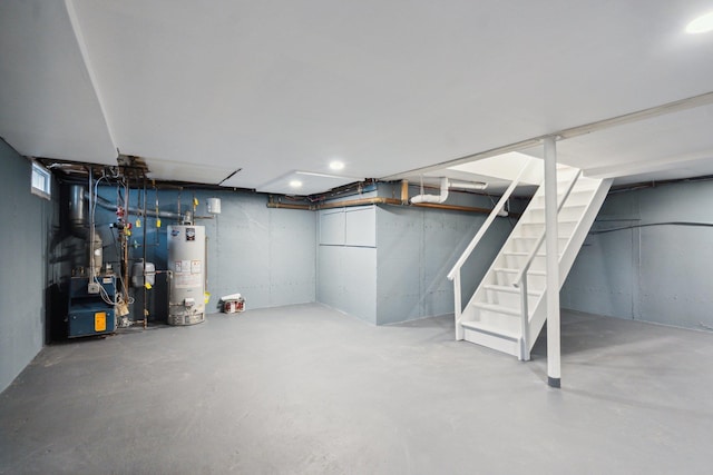 basement featuring water heater, stairway, and a heating unit