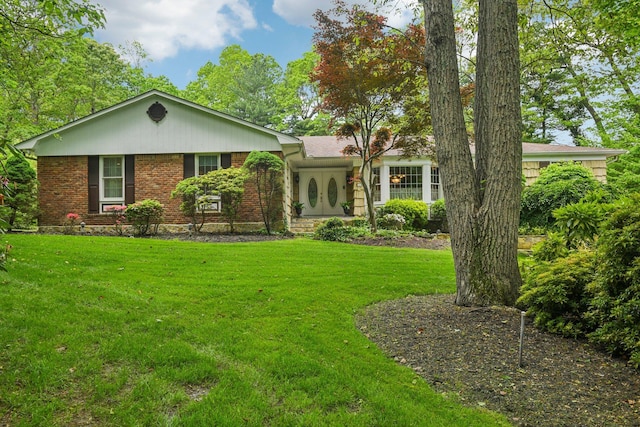 28 Stepping Stone Cres, Dix Hills, NY 11746 - ranch-style house with brick siding and a front yard