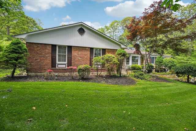28 Stepping Stone Cres, Dix Hills, NY 11746 - view of front of property with brick siding and a front lawn