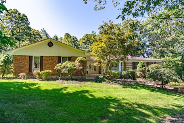 28 Stepping Stone Cres, Dix Hills, NY 11746 - ranch-style home with brick siding and a front lawn