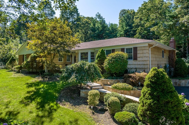28 Stepping Stone Cres, Dix Hills, NY 11746 - view of front facade featuring a chimney and a front lawn