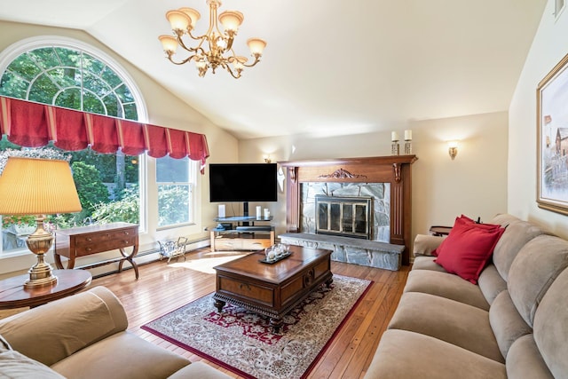 28 Stepping Stone Cres, Dix Hills, NY 11746 - living room with lofted ceiling, hardwood / wood-style flooring, a chandelier, and a high end fireplace