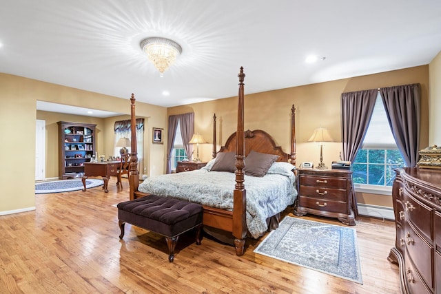 28 Stepping Stone Cres, Dix Hills, NY 11746 - bedroom with a baseboard heating unit, light wood-type flooring, baseboards, a desk, and recessed lighting