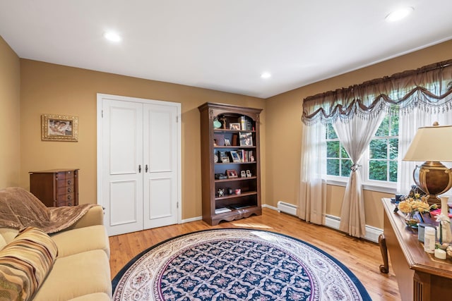28 Stepping Stone Cres, Dix Hills, NY 11746 - office area featuring baseboard heating, light wood finished floors, a baseboard radiator, baseboards, and recessed lighting