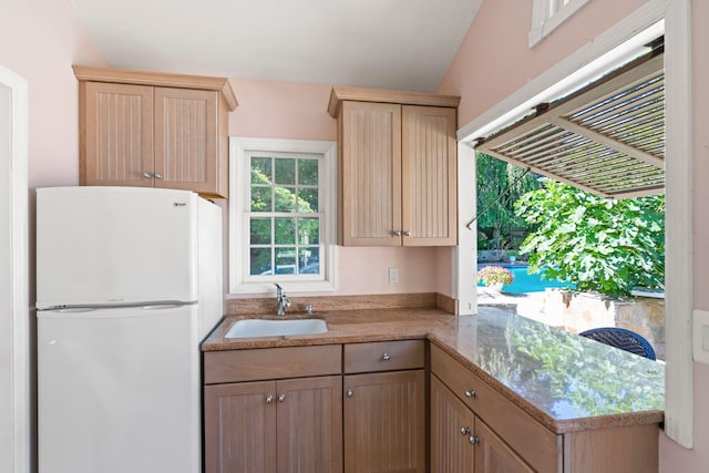 28 Stepping Stone Cres, Dix Hills, NY 11746 - kitchen with freestanding refrigerator, a sink, light brown cabinetry, and light stone counters