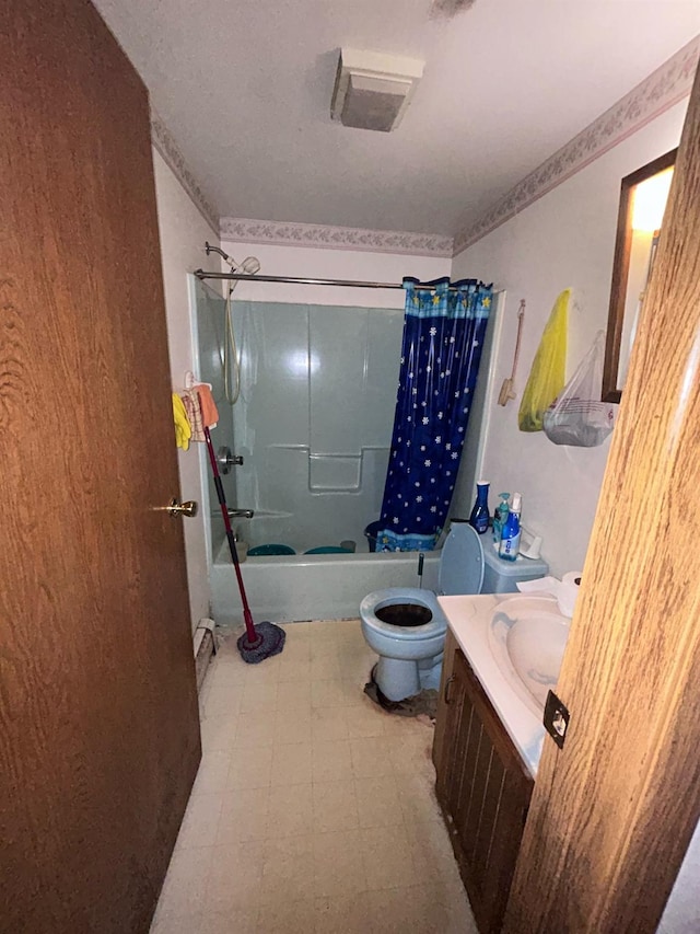 full bath with tile patterned floors, vanity, toilet, and shower / bath combination