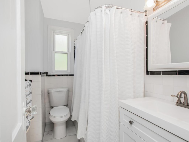 77 Hilltop Acres Unit 77, Yonkers, NY 10704 - full bathroom with toilet, tile walls, and vanity