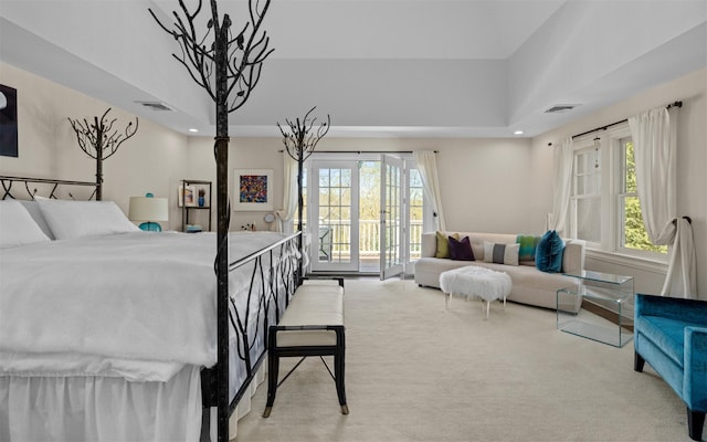 carpeted bedroom featuring visible vents, recessed lighting, and access to outside