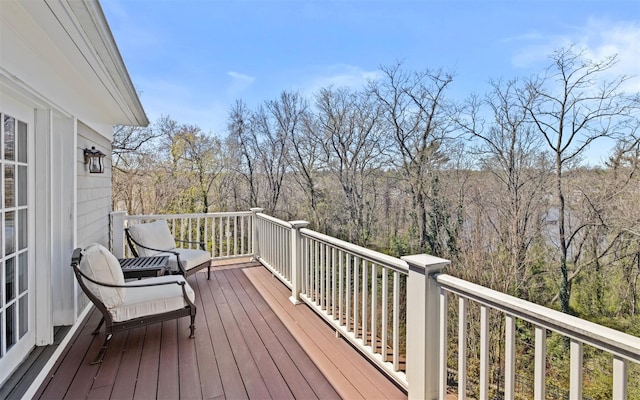 deck with a wooded view
