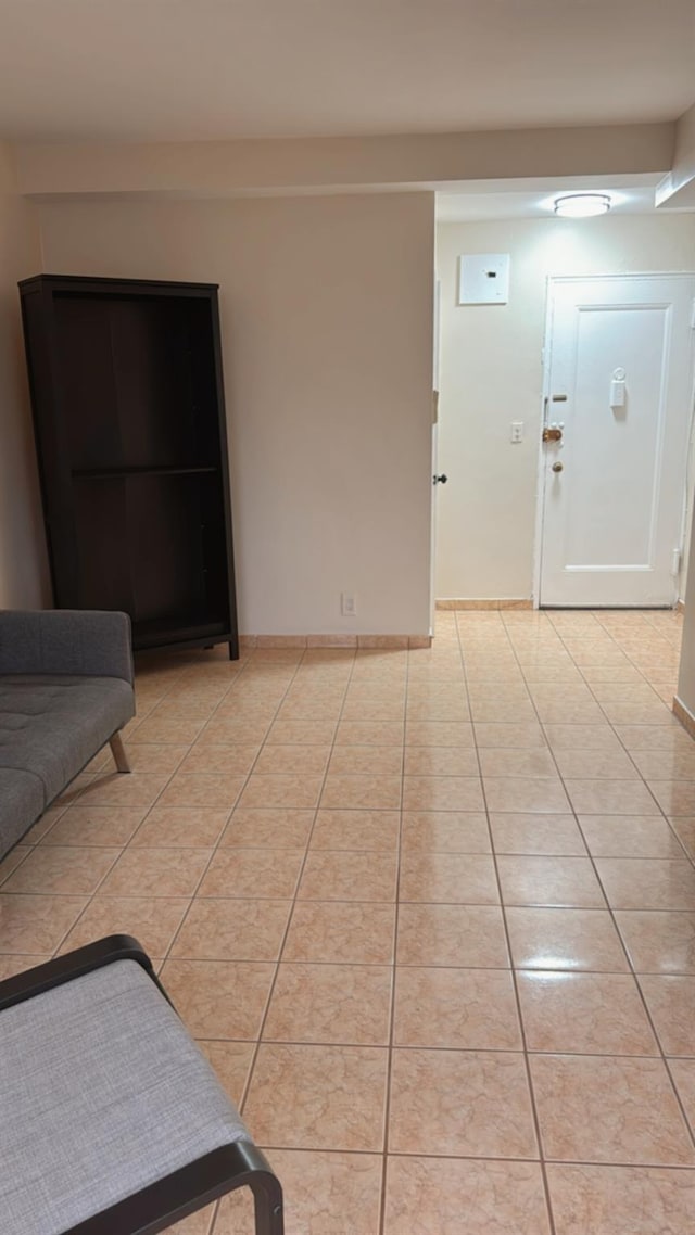 living area featuring light tile patterned floors