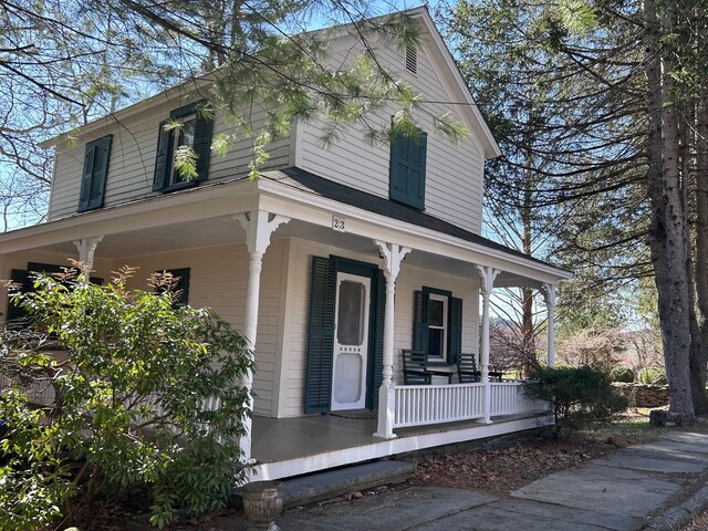 farmhouse-style home with a porch